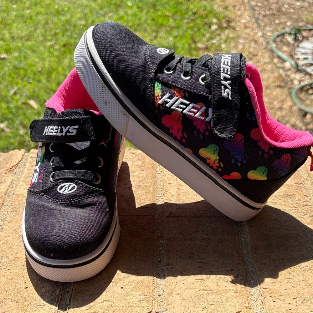 Heelys Kids Black wheeled shoes with Rainbow Heart Prints and Pink Lining